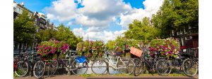 bikes_along_amsterdam_canal_eco_friendly