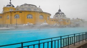 Hot springs next to a snow-covered building