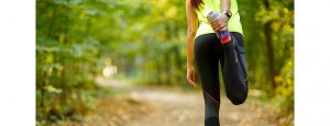 woman_stretching_in_park