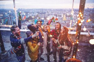 Group of friends at rooftop party