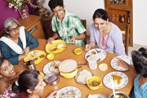 Asian Indian Family Enjoying Meal Together