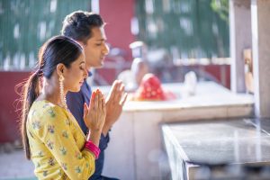 Indian Family Praying Together at