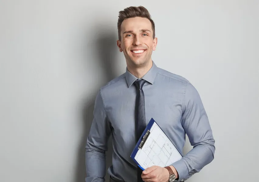 Smiling young man in short and tie