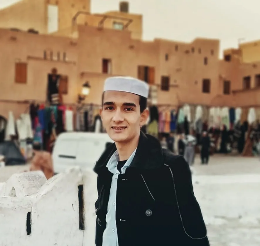 Young male Algerian smiling