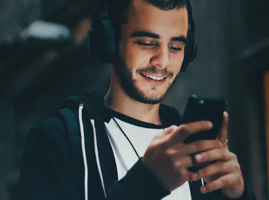 man_with_mobile_and_headphones